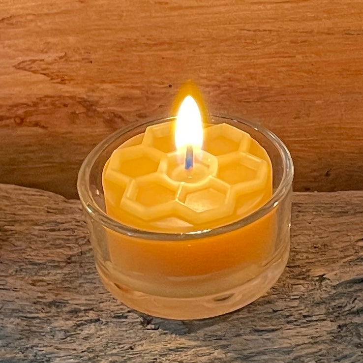 Beeswax tea light with a honeycomb design from Happy Flame