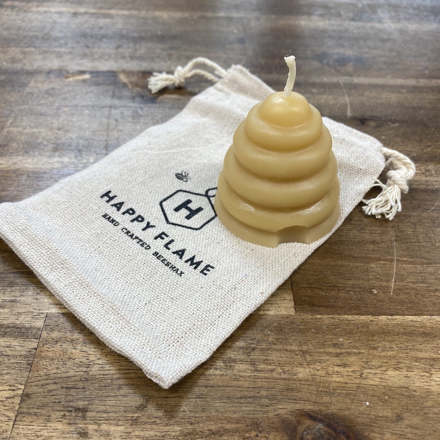 Beehive skep candles- hand crafted from Australian Certified organic beeswax Decorative Happy Flame 1 x Beehive skep candle in a cotton bag