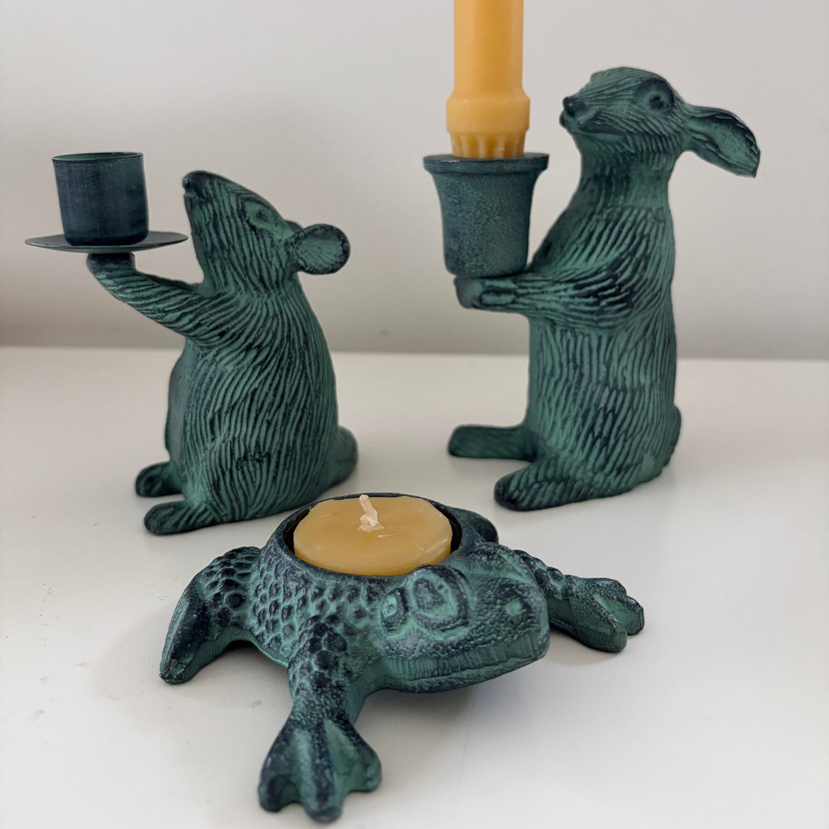 Three animal shaped Metal candle holders with Antique finish holding a candle- Happy Flame