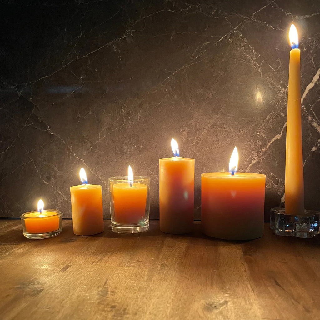 A collection of beeswax candles from Happy Flame