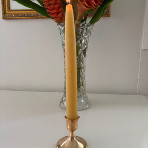 Metal candle stick holder with beeswax candle
