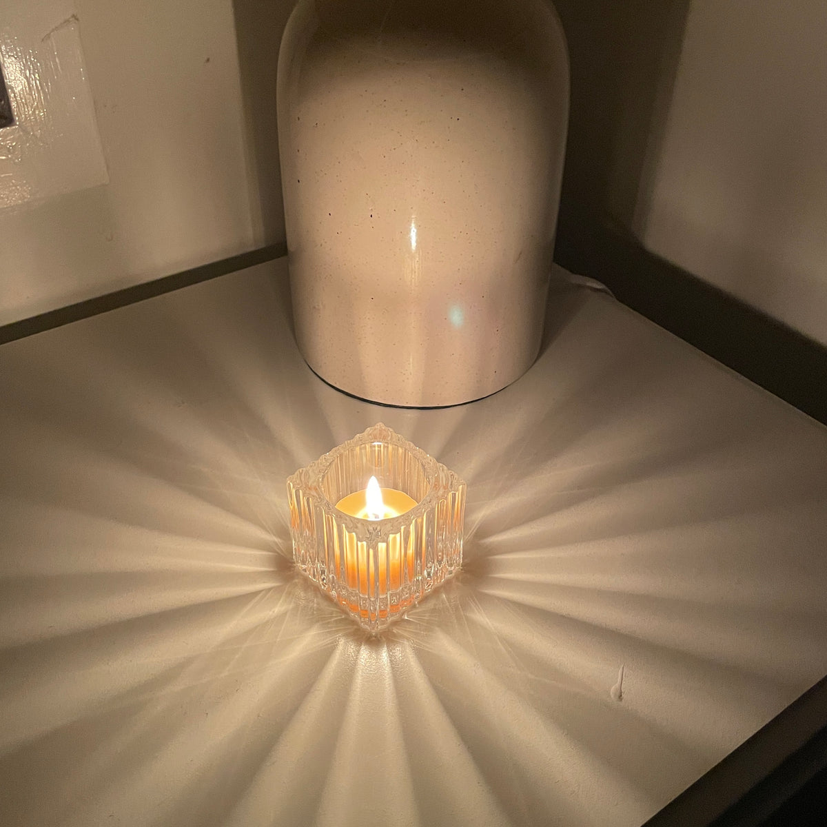 Square glass candle holder- ribbed decoration on the outside
