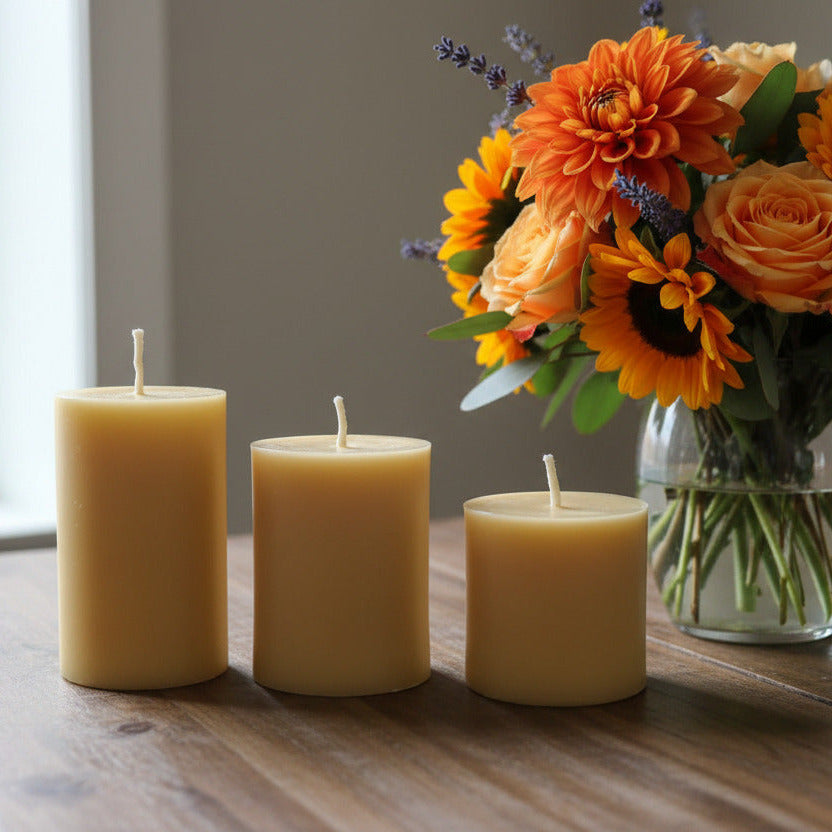 Winter Warmer Beeswax Candle Pack with a vase of flowers - Happy Flame